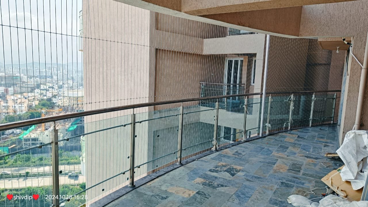 Invisible grill on large apartment balcony